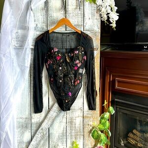 Floral lace bodysuit.